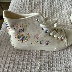 American Eagle high top pride sneakers.
